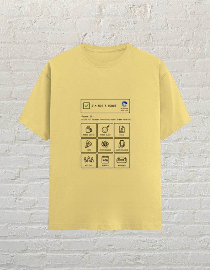CoreTeez yellow unisex cotton t-shirt featuring a funny I'm Not A Robot graphic print.